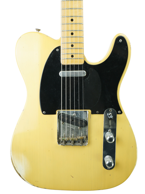 1962 Fender Telecaster in yellow, a 1998 Cunetto Nocaster Relic from the Fender Custom Shop, highlighting its classic appeal.