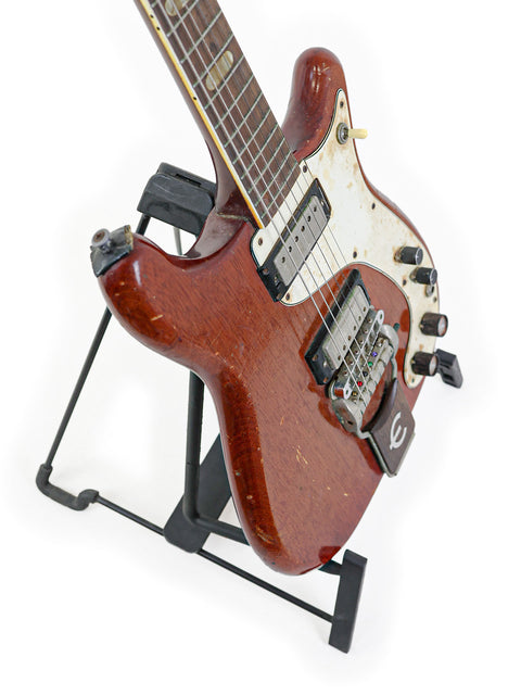 1966 Epiphone Crestwood Custom guitar on a stand, showcased with a minimalist white background.