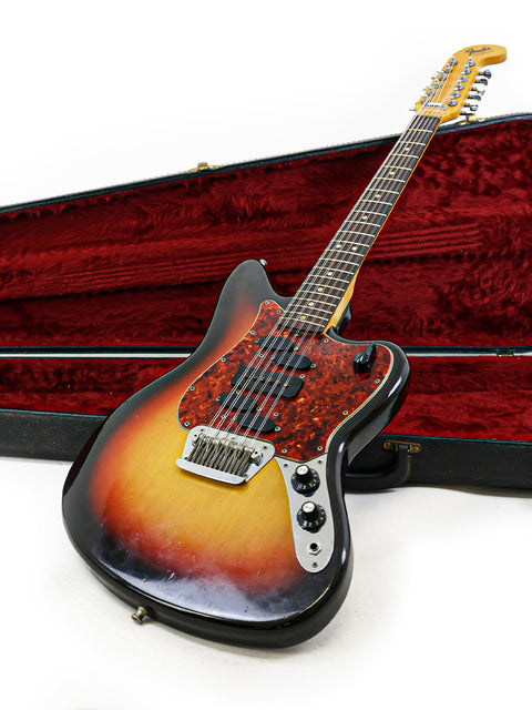 1966 Vintage Fender Electric XII guitar with its case, elegantly placed on a white background. A true collector's piece!