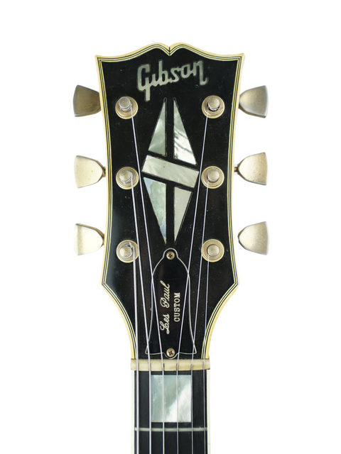 1973 Gibson Les Paul Custom Black Beauty, an iconic vintage guitar known for its quality and classic aesthetics.