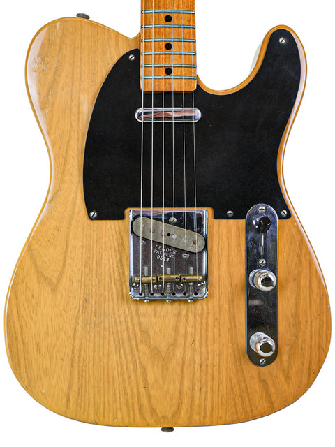 1982 Fender AVRI ‘52 Telecaster guitar with a stylish black pickup, perfect for any music lover.