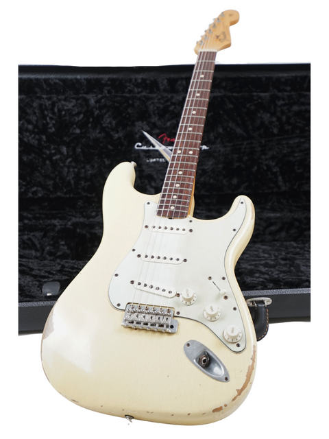 2009 Fender Custom Shop '64 Stratocaster Relic in white, featuring classic styling and premium craftsmanship.