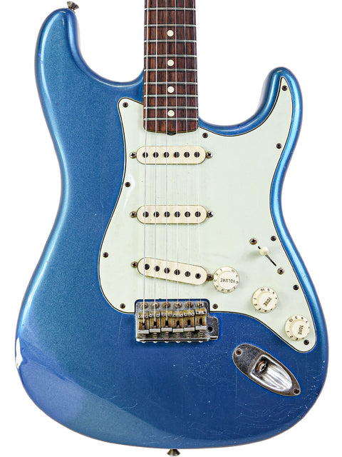 2009 Fender Custom Shop 'Time Machine' '62 Stratocaster Relic, featuring a classic sunburst finish and vintage appeal.