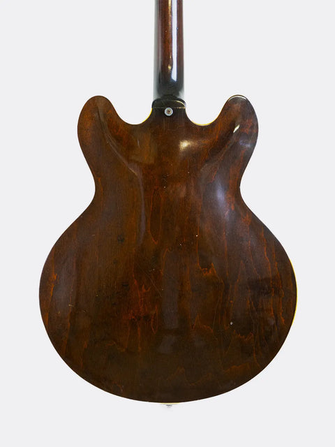 Gibson ES-335 guitar on a white background