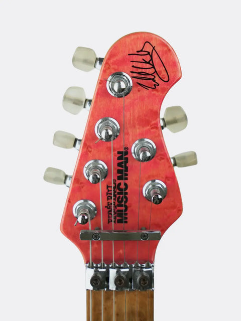 1992 Ernie Ball Music Man EVH Signature headstock with tuning pegs on a white background