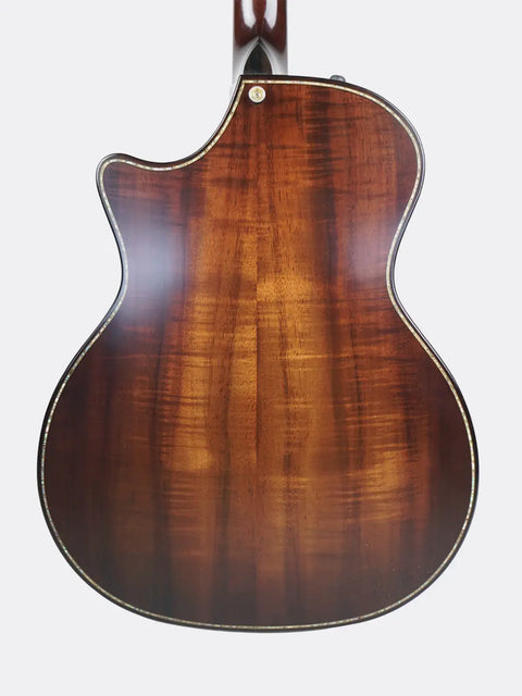 Close-up of a 2018 Taylor K14ce wooden body on a white background