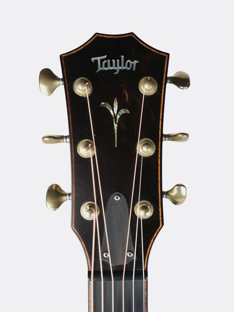 2018 Taylor K14ce headstock with tuning pegs on a white background
