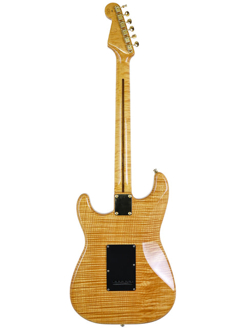 A 1992 Fender Custom Shop 'Clapton' Stratocaster featuring a beautifully crafted wooden body and neck.