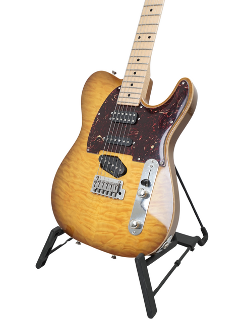 A 2005 Tom Anderson Hollow T Classic guitar, featuring a brown body, displayed on a stylish black stand.