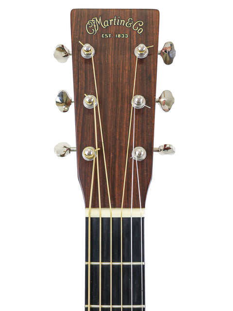 A Martin LP-1 acoustic guitar, showcasing its elegant design and craftsmanship, made in the USA in 2012.