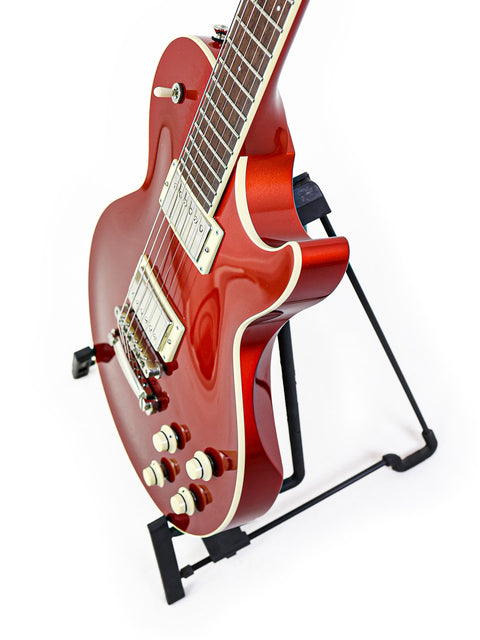 A red electric guitar on a stand, showcasing the Collings CL Deluxe model from the USA, crafted in 2019.