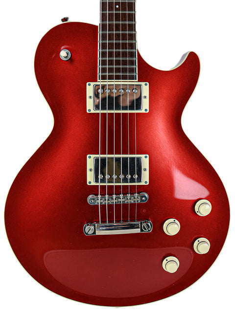A red electric guitar with a black pickguard, showcasing the Collings CL Deluxe model from the USA, 2019 edition.