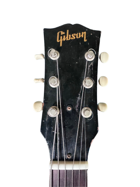 A stunning 1961 Gibson Les Paul Standard guitar, featuring a beautiful finish and timeless appeal.