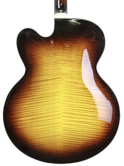 A stunning Gibson L-5 CES guitar with a sunburst finish, showcasing its elegant design and craftsmanship from 2002.