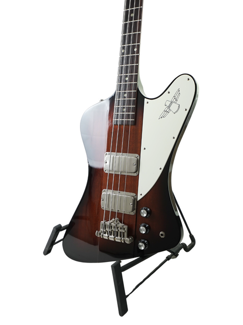 A stylish black guitar featuring a white pickguard, highlighting its elegant look and appeal to musicians.