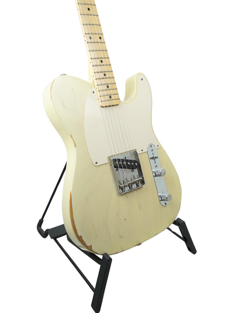 A white electric guitar, specifically a 2003 Fender Custom Shop '59 Esquire Journeyman Relic, resting on a stand.