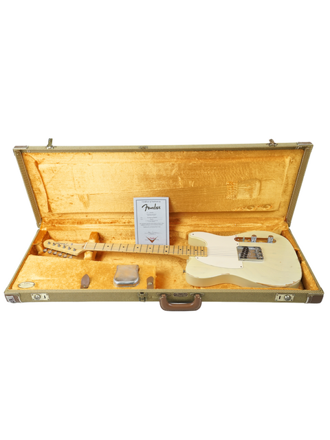 A white guitar, the Fender Custom Shop '59 Esquire Journeyman Relic, securely placed in its protective case.