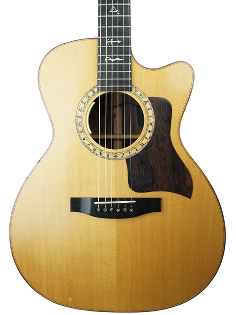 A wooden-bodied Lakewood M-NC CP New Century II Grand Concert guitar from Germany, 2004, with a stylish black pickguard.