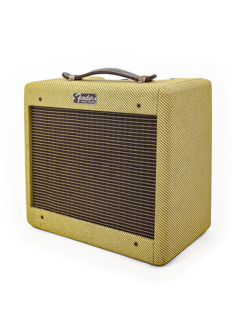 A yellow Fender Custom Shop '57 Champ Combo guitar amplifier displayed against a clean white background.