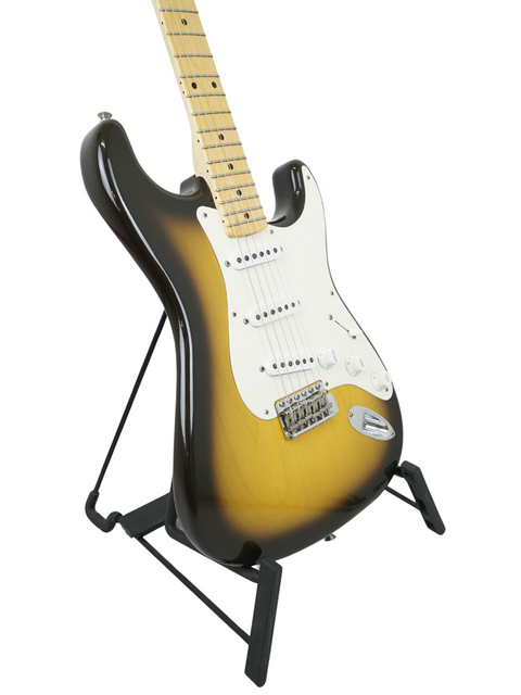 A yellow Fender guitar on a stand, representing the Paul Waller Masterbuilt '56 Stratocaster from the USA, 2020 edition.