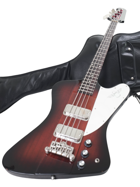 An Orville Thunderbird Bass in Tobacco Burst, complete with a case and strap, highlighting its 1988 Japanese design.