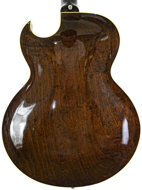 Back of a vintage 1959 Gibson ES-225TD guitar, highlighting its beautiful brown finish and timeless craftsmanship.