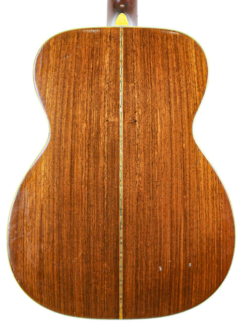 Back view of a 1951 Gibson J-45 guitar, emphasizing its timeless design and vintage quality.