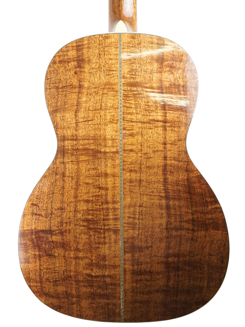 Back view of a Martin 000-28K Authentic 1921 acoustic guitar, showcasing its elegant wood grain and craftsmanship.