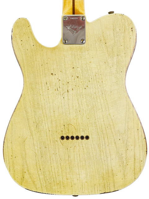 Back view of a yellow Fender guitar, showcasing the craftsmanship of the 70th Anniversary Nocaster by Kyle McMillin.