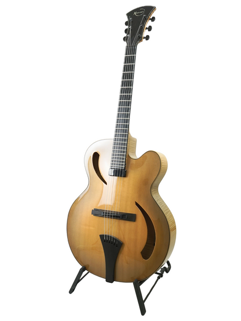Beautiful 2015 Hancock Phantom Custom Archtop guitar displayed on a stand, perfect for musicians seeking style and quality.