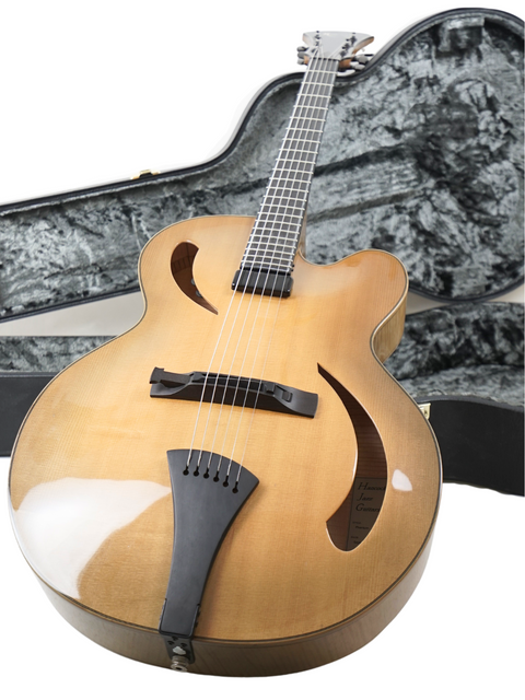 Beautiful 2015 Hancock Phantom Custom Archtop guitar displayed with a case and stand, ideal for any music enthusiast's collection.