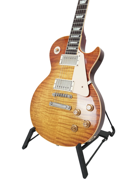 Beautiful Gibson Les Paul '59 Reissue LPR-9 electric guitar displayed on a stand, featuring a premium Brazilian board for superior sound.