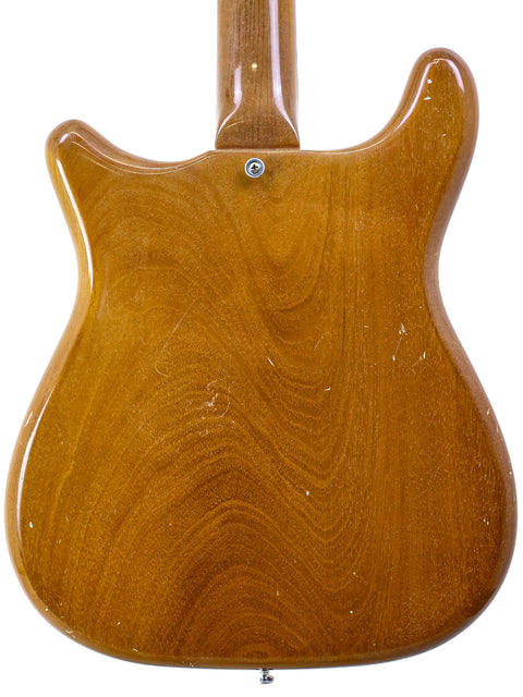 Beautiful wooden body and neck of a 1964 Epiphone Crestwood Custom guitar, a true vintage gem for musicians.