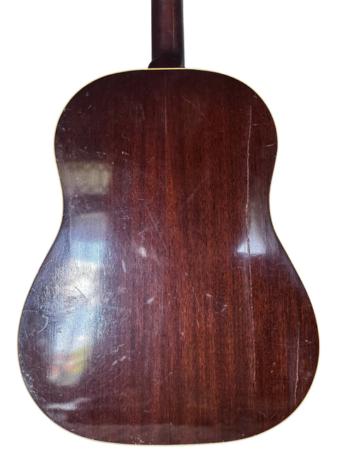 Beautifully aged 1955 Gibson J-45 acoustic guitar, representing timeless design and quality, made in the USA.