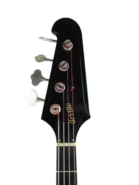 Black bass guitar with a white headstock, showcasing the Orville Thunderbird Bass in Tobacco Burst, made in Japan, 1988.