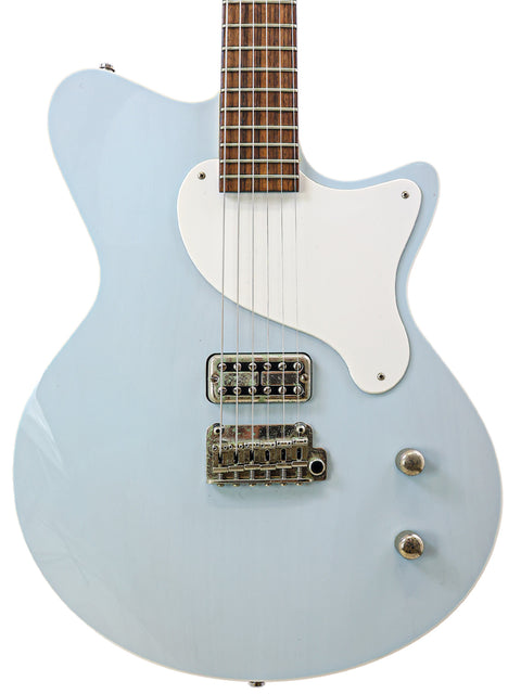 Blue electric guitar featuring a white pickguard, Koll Troubadour model from the USA, crafted in 2013, highlighting its vibrant color.