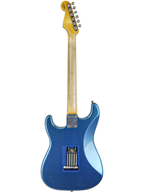 Blue electric guitar with a wooden body, Fender Custom Shop ‘62 Stratocaster Relic, USA, 2009 model.