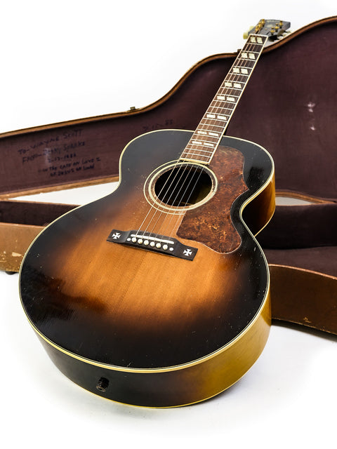 Classic 1951 Gibson J-45 acoustic guitar, representing vintage American guitar-making excellence.