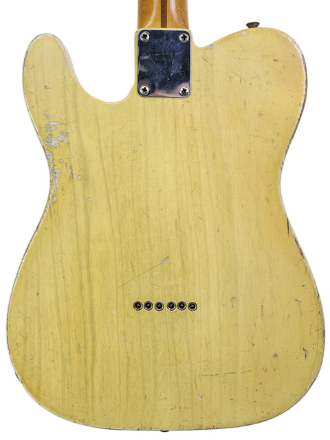 Classic 1954 Fender Telecaster 'Blackguard' with a rich wooden body and neck, embodying vintage guitar craftsmanship.