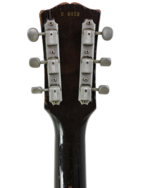 Classic 1961 Gibson Les Paul Standard in TV Yellow, representing the iconic design of vintage American guitars.
