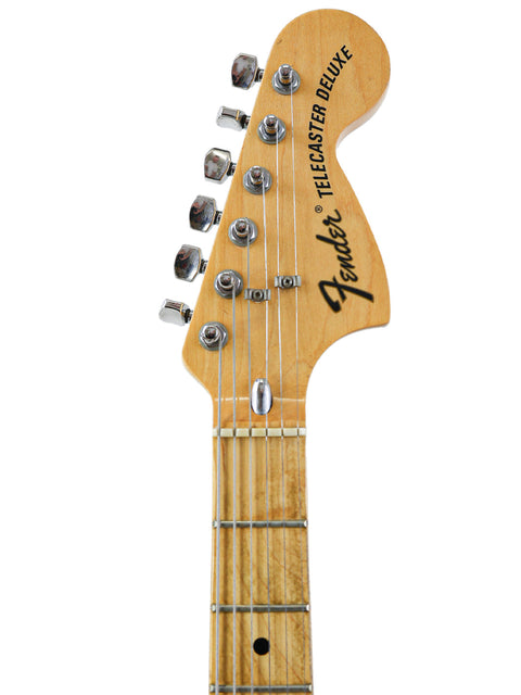 Classic 1973 Fender Telecaster Deluxe electric guitar, featuring a timeless design and rich sound, perfect for any musician.