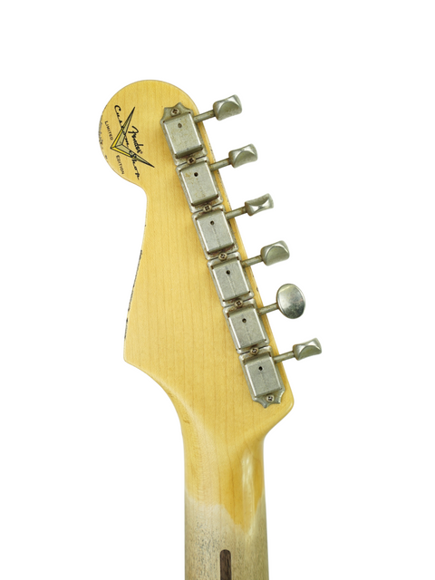 Close-up of a Fender Custom Shop EL Diablo Strat neck on a white background, showcasing its relic finish and craftsmanship.