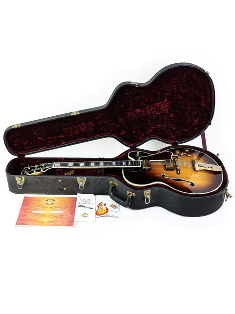 Close-up of a Gibson L-5 CES guitar in its case, highlighting the exquisite details of this 2002 USA model.