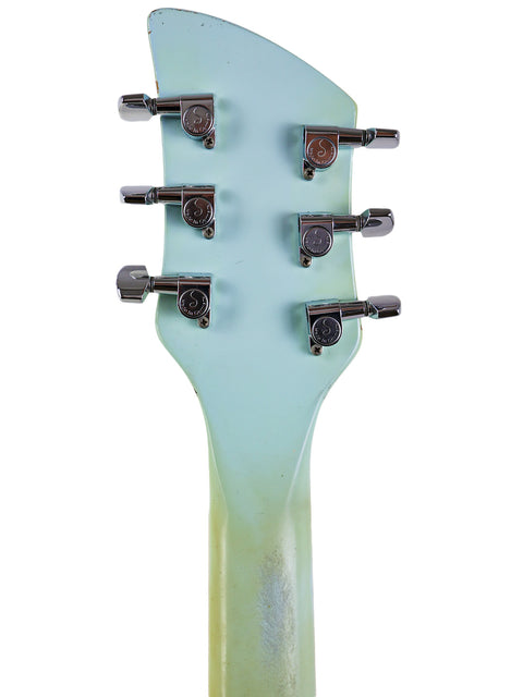 Close-up of a Rickenbacker 650C Colorado guitar headstock featuring four tuning knobs, showcasing its craftsmanship from 2005.