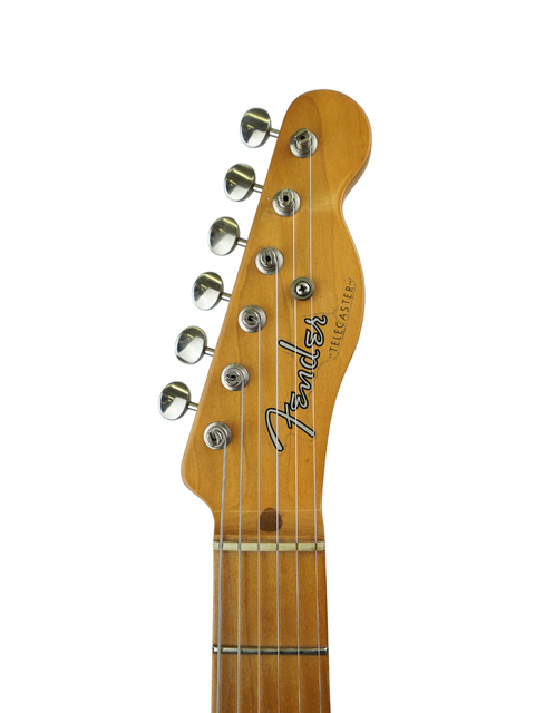 Close-up of a guitar headstock with tuning pegs and logo, isolated on a white background.