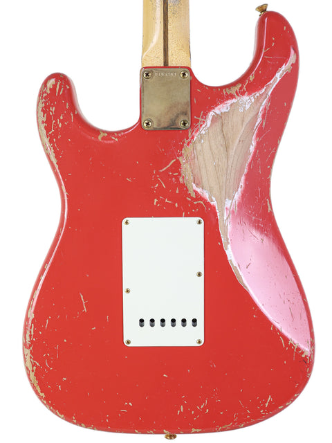 Close-up of a red 1956 Fender Stratocaster guitar featuring a white pick guard, crafted by Dennis Galuszka in 2021.