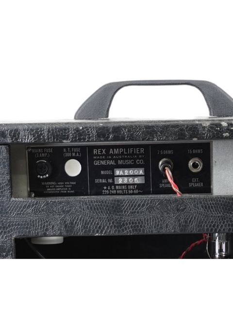 Close-up view of a vintage 1969 Rex Bassking Combo amp, highlighting its wires and power cord.