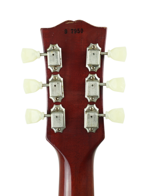 Detailed view of a 2007 Gibson Les Paul '59 Reissue headstock with four knobs, perfect for guitar enthusiasts seeking quality.