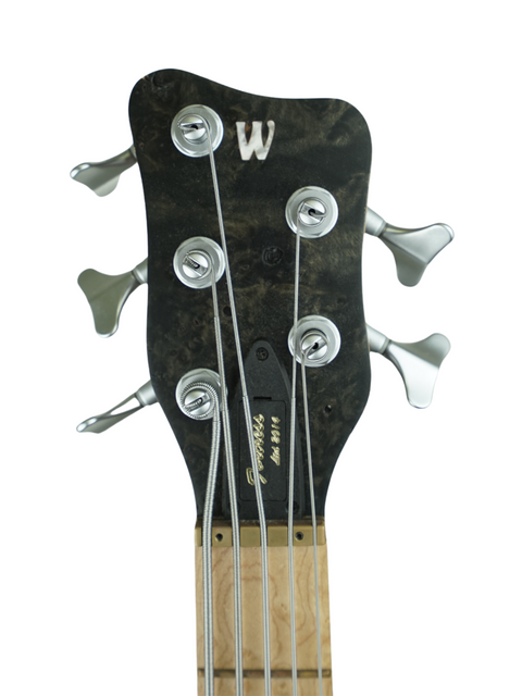 Detailed view of a Warwick Fortress bass head, featuring four strings, highlighting its unique design from Germany, 2014.