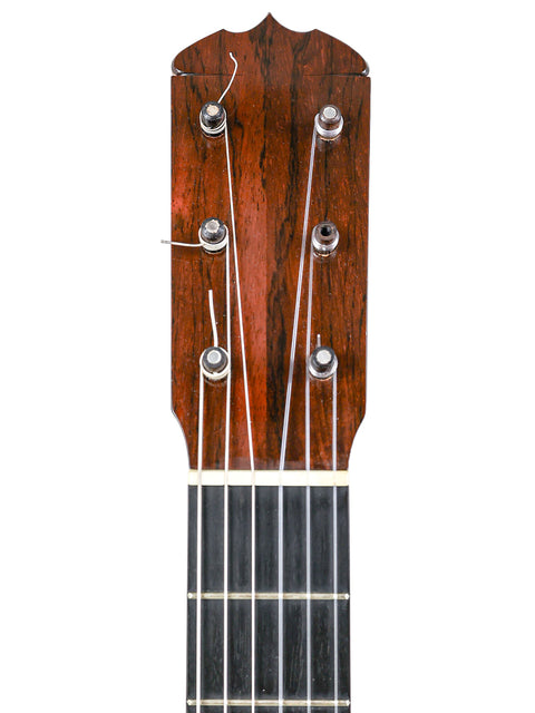 Detailed view of a guitar neck on a white backdrop, highlighting the elegance of a 1963 José Ramírez 2A Concepcion Jeronima #2.